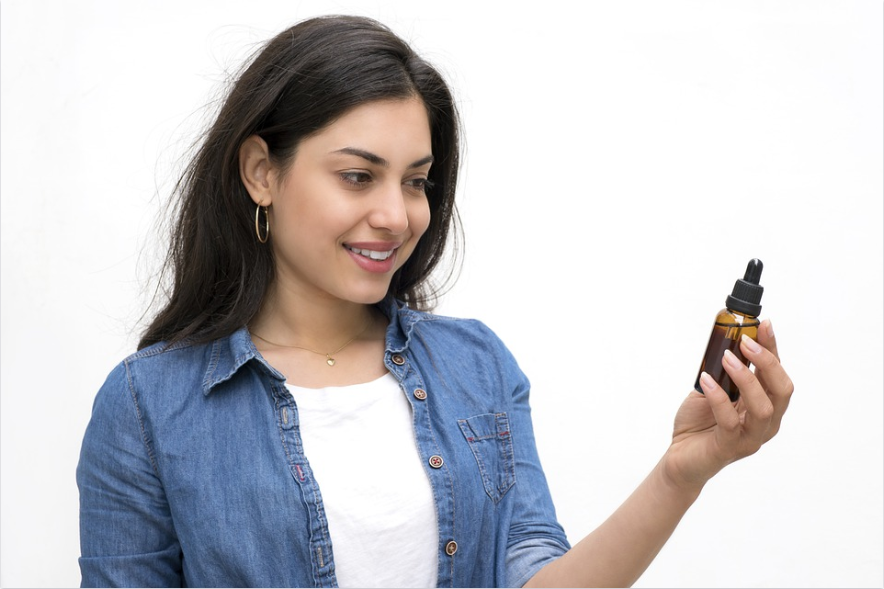 CBD oil woman